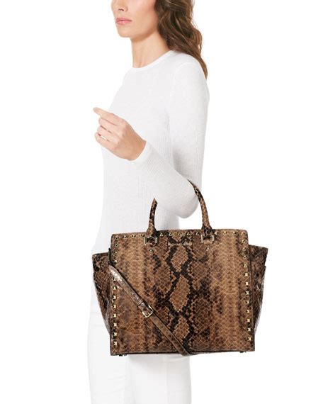 michael kors snake print tote|Michael Kors snakeskin clutch.